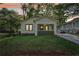 Charming bungalow featuring a welcoming front porch and a well-maintained lawn at 39 Wyman Se St, Atlanta, GA 30317