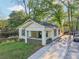 Charming home with a inviting front porch, freshly painted trim, and a well-manicured lawn at 39 Wyman Se St, Atlanta, GA 30317
