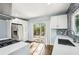 Bright kitchen with stainless steel appliances and access to the outdoor deck at 39 Wyman Se St, Atlanta, GA 30317