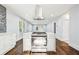 Modern kitchen features a central island cooktop with bar seating at 39 Wyman Se St, Atlanta, GA 30317