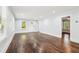 Bright living room with gleaming hardwood floors, large windows, and an open layout at 39 Wyman Se St, Atlanta, GA 30317