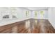 Bright living room with gleaming hardwood floors, large windows, and an open layout at 39 Wyman Se St, Atlanta, GA 30317