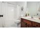 Practical bathroom offers a vanity sink combination with shower and tub at 448 Cape Ivey Dr, Dacula, GA 30019
