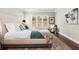 Cozy bedroom featuring a plush bed, soft rug, and calming decor for ultimate comfort and relaxation at 448 Cape Ivey Dr, Dacula, GA 30019