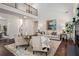 A living room view from an elevated vantage, showcasing hardwood floors and a fireplace at 448 Cape Ivey Dr, Dacula, GA 30019