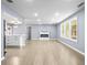 Spacious living room featuring hardwood floors, recessed lighting, and a fireplace at 2013 Ridge Rd, Dallas, GA 30157