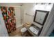 Bathroom featuring a granite vanity, tiled floor, and shower with curtain at 2881 Parrott Nw Ave, Atlanta, GA 30318