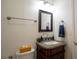 Cozy bathroom with granite vanity and classic fixtures at 2881 Parrott Nw Ave, Atlanta, GA 30318