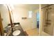 Bathroom showcasing double sinks, a framed mirror, and shower-tub combination at 2881 Parrott Nw Ave, Atlanta, GA 30318