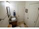 Updated bathroom with granite vanity and plenty of storage at 2881 Parrott Nw Ave, Atlanta, GA 30318