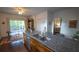 Bright kitchen with stainless appliances, granite counters, island and slider to the deck at 2881 Parrott Nw Ave, Atlanta, GA 30318