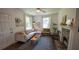 Bright living room with stylish furnishings, decorative fireplace, and large windows at 2881 Parrott Nw Ave, Atlanta, GA 30318