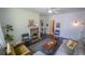 Stylish living room with hardwood floors, a classic fireplace, and ample seating at 2881 Parrott Nw Ave, Atlanta, GA 30318