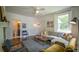 Inviting living room boasting hardwood floors, a fireplace, and a comfortable seating area at 2881 Parrott Nw Ave, Atlanta, GA 30318