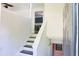 Inviting entryway with stairs leading to the upper level and a glimpse of the kitchen at 3785 Willow Ridge Rd, Douglasville, GA 30135