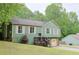 Well-maintained two-story home featuring an attached two-car garage and cozy front porch at 3785 Willow Ridge Rd, Douglasville, GA 30135