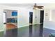 View of the living room and view of the kitchen, featuring hardwood floors at 3785 Willow Ridge Rd, Douglasville, GA 30135