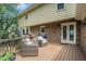 Cozy back deck with comfortable seating, perfect for enjoying outdoor relaxation and entertaining at 751 Yorkshire Sw Pl, Lilburn, GA 30047