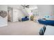 Large bedroom with two beds, a seating area, and lots of room to play at 751 Yorkshire Sw Pl, Lilburn, GA 30047