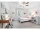 Bright bedroom featuring a single bed, study space, and a cozy atmosphere at 751 Yorkshire Sw Pl, Lilburn, GA 30047