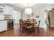 Dining room with hardwood floors and stairs visible in the background at 751 Yorkshire Sw Pl, Lilburn, GA 30047