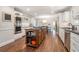 Spacious kitchen with stainless steel appliances, custom island, and modern finishes at 751 Yorkshire Sw Pl, Lilburn, GA 30047