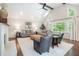 Inviting living room with comfortable seating, fireplace, and an airy feel at 751 Yorkshire Sw Pl, Lilburn, GA 30047