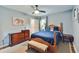 Cozy bedroom featuring a wooden bed frame, soft blue bedding, and matching side tables at 1626 Oak Knoll Se Cir, Atlanta, GA 30315