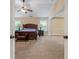Large primary bedroom with ample space, neutral color palette, and natural light at 305 Spooner Dr, Mcdonough, GA 30252