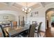Dining area with hardwood floors and views of the living room, perfect for gatherings and entertaining at 305 Spooner Dr, Mcdonough, GA 30252