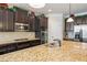 Gourmet kitchen with stainless steel appliances, gas cooktop, and ample cabinet space at 305 Spooner Dr, Mcdonough, GA 30252