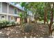 Private backyard featuring mature trees and landscaping, perfect for relaxing or entertaining at 4941 Meadow Lane, Marietta, GA 30068