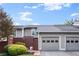 Charming townhouse with a two-car garage, well-maintained landscaping, and a private fenced entrance at 4941 Meadow Lane, Marietta, GA 30068