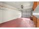 Spacious two-car garage with ample lighting, pegboards, and storage shelving at 4941 Meadow Lane, Marietta, GA 30068