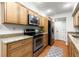 Well-equipped kitchen with granite counters, stainless steel appliances, and ample cabinet storage at 4941 Meadow Lane, Marietta, GA 30068
