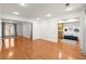 Bright living room with hardwood floors, recessed lighting, and french doors leading to the outdoor space at 4941 Meadow Lane, Marietta, GA 30068