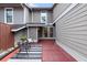 Charming patio area with outdoor seating, providing a tranquil setting with a view of the landscaped yard at 4941 Meadow Lane, Marietta, GA 30068