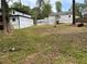 An expansive backyard with trees, offering lots of space and a gentle slope at 2058 North Nw Ave, Atlanta, GA 30318