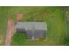 Aerial view of the property showcasing its roofline and surrounding land at 2068 Hampton Locust Grove Rd, Locust Grove, GA 30248