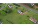 Expansive property with mature trees, a home with a dark roof, and a long private driveway from a main road at 2068 Hampton Locust Grove Rd, Locust Grove, GA 30248