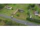 An aerial shot of a house on a large lot with mature trees and a long driveway at 2068 Hampton Locust Grove Rd, Locust Grove, GA 30248