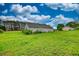 Expansive backyard with lush green grass, providing a serene and private outdoor space at 2068 Hampton Locust Grove Rd, Locust Grove, GA 30248
