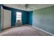 Bedroom featuring contrasting colors, a ceiling fan, and natural light from the window at 2068 Hampton Locust Grove Rd, Locust Grove, GA 30248