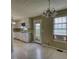 Bright eat-in kitchen with white cabinets and ample natural light, perfect for casual dining at 2068 Hampton Locust Grove Rd, Locust Grove, GA 30248