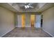 Main bedroom with comfortable carpet, and a tray ceiling at 2068 Hampton Locust Grove Rd, Locust Grove, GA 30248