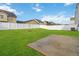 Level backyard with new fence and concrete patio at 340 Paulownia Cir, Mcdonough, GA 30253