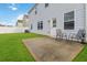 Backyard with chairs and grass at 340 Paulownia Cir, Mcdonough, GA 30253