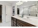 Double sink bathroom features dark cabinets, a soaking tub and shower stall at 340 Paulownia Cir, Mcdonough, GA 30253