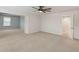 This spacious bonus room boasts neutral walls and carpeted flooring at 340 Paulownia Cir, Mcdonough, GA 30253