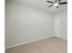 The bedroom has neutral walls, neutral carpet, and a ceiling fan at 340 Paulownia Cir, Mcdonough, GA 30253